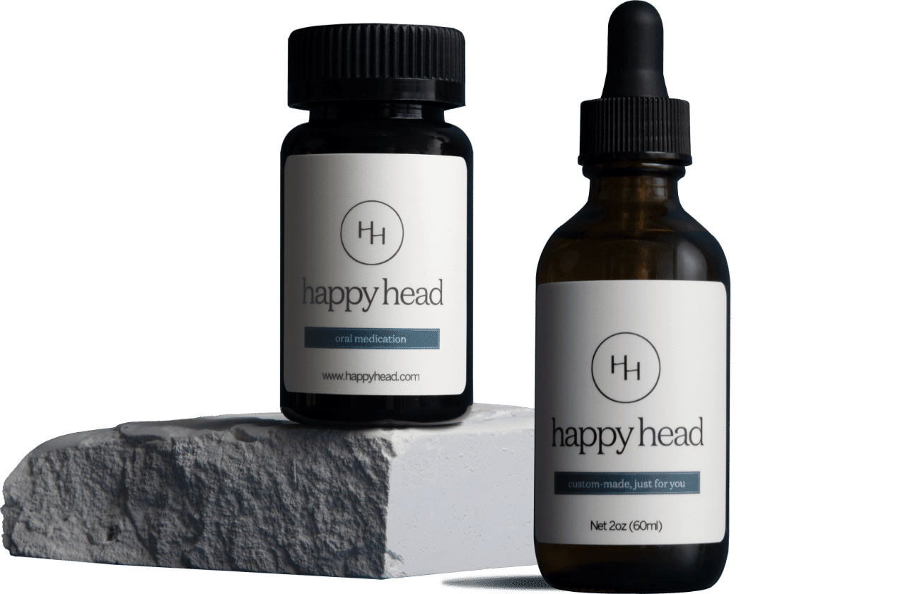 Happy Head formula bottle of topical Finasteride for hair loss and hair growth